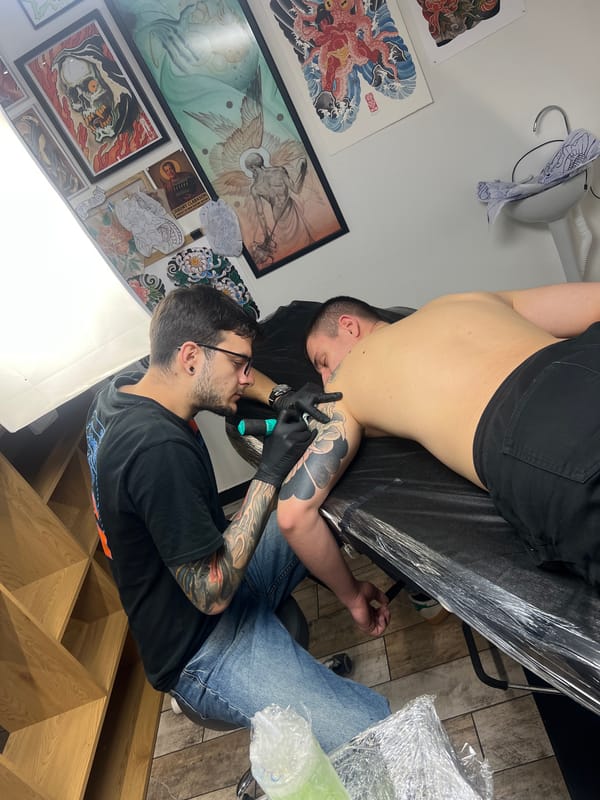 Tattoo artist works on customer in Sofia studio