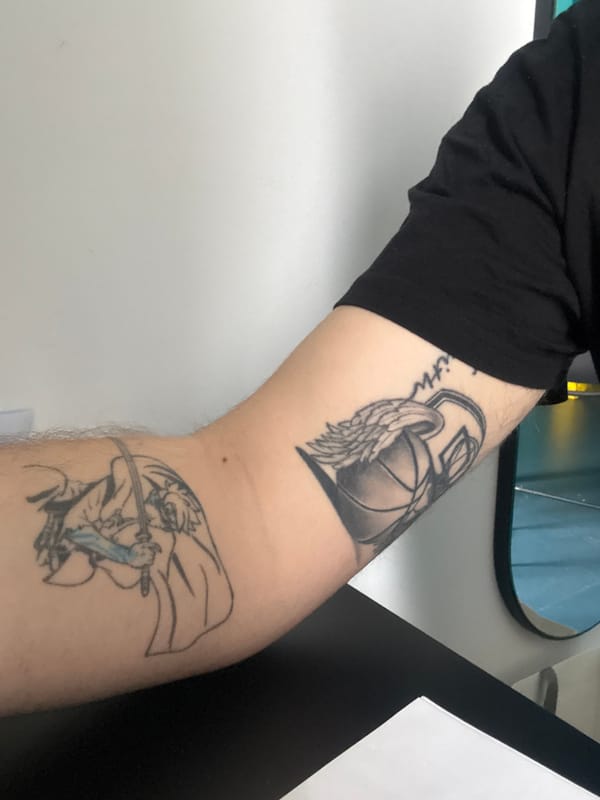 Personal documentation session captures tattoos, workspace in Novate Milanese