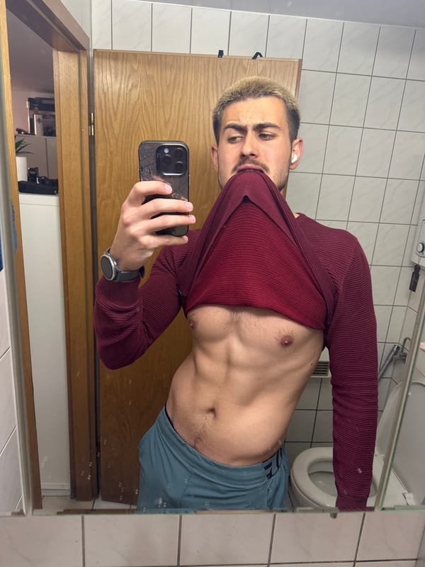 Man takes bathroom mirror selfies in Essen, Germany
