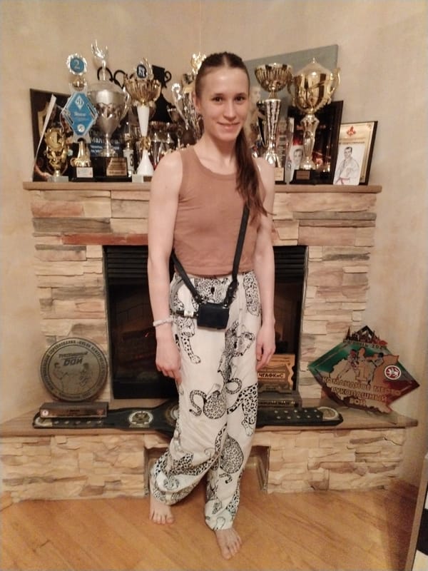 Woman photographed in multiple rooms during Chaikovsky home visit