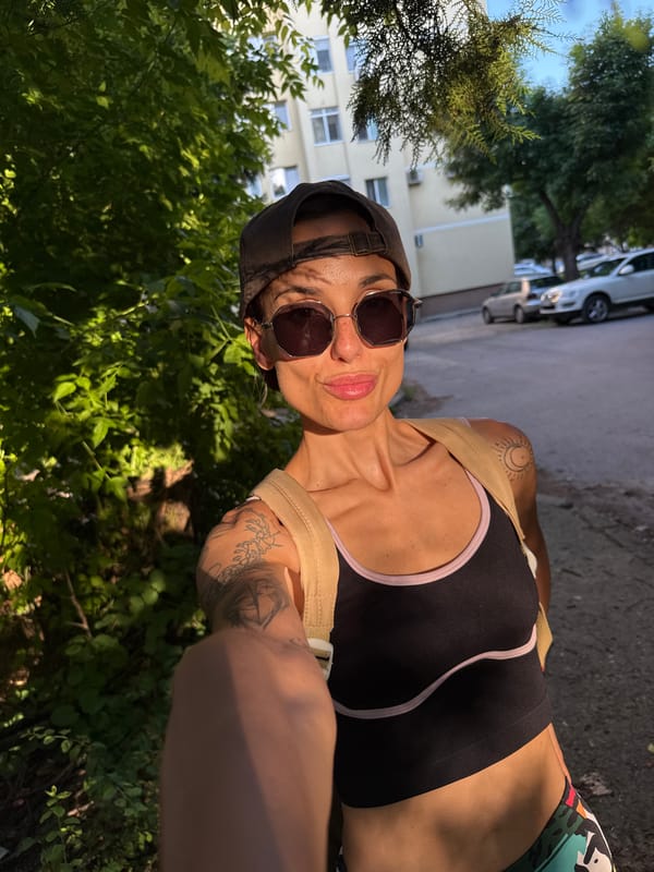 Woman takes selfie in athletic wear near Pleven, Bulgaria
