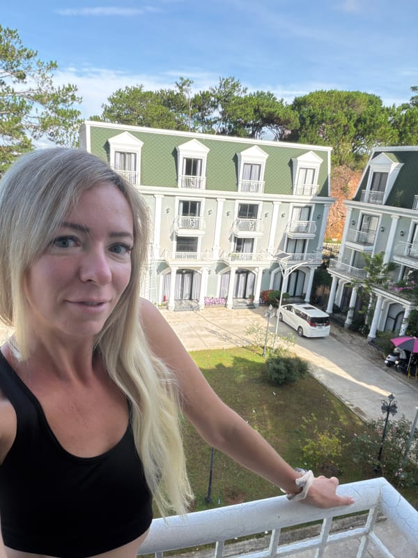 Tourist Takes Selfies Around Da Lat Vietnam Buildings