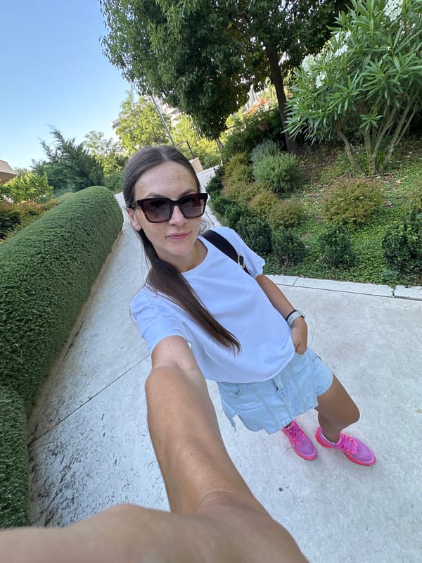 Selfie series on a sunny Bečići walkway, oleander in bloom