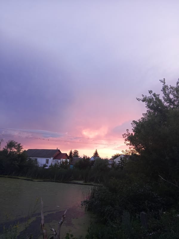 Summer dusk sky over rural Panino, Russia