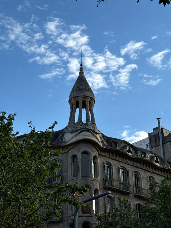 Pedestrian and Gaudí landmarks photographed in central Barcelona