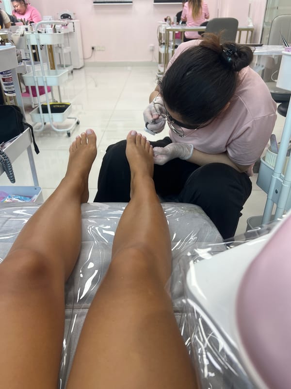 Woman provides pedicure service at Business Bay salon