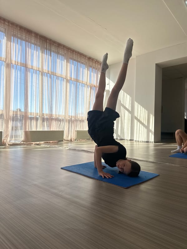 Dance studio stretching session observed in Votkinsk, Russia