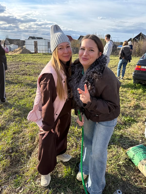 Family gathering celebrates outdoors in rural Russian village