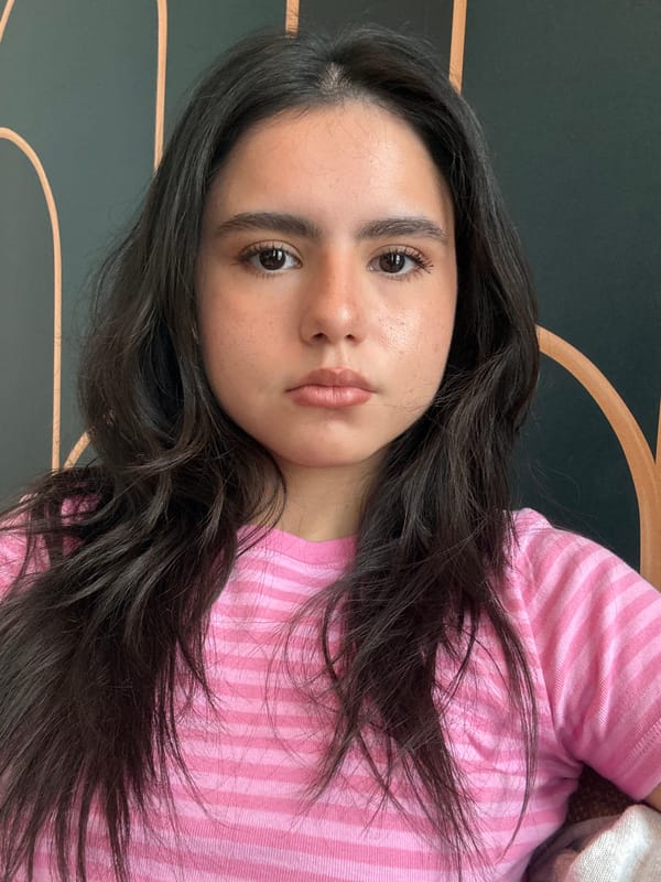 Woman takes selfies indoors in Austin