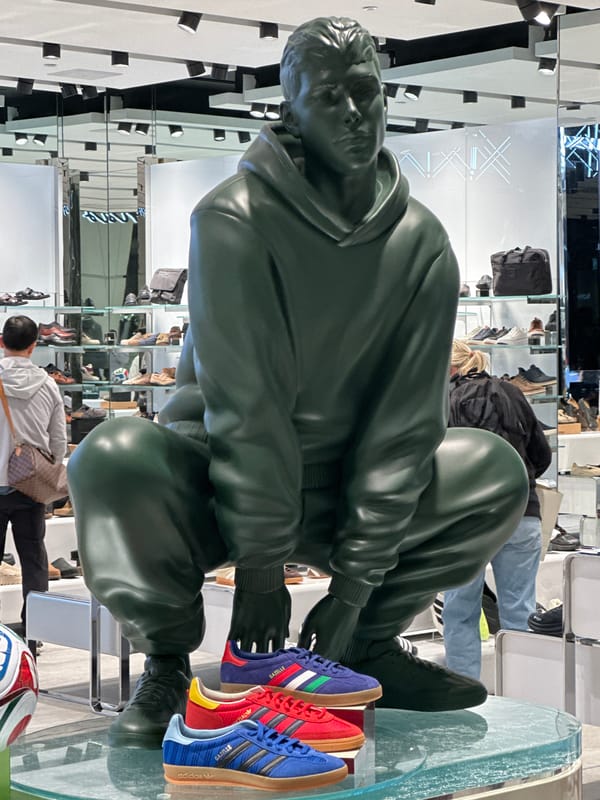 Hooded figure statue displayed in Burnaby retail store