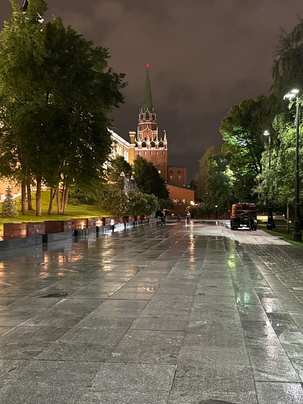 Nighttime views of illuminated Moscow Kremlin captured from multiple angles