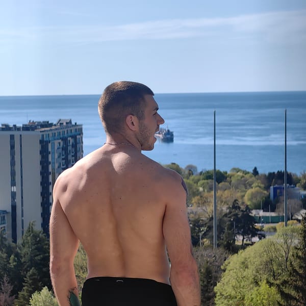 Man observes morning coastal view in Varna, Bulgaria