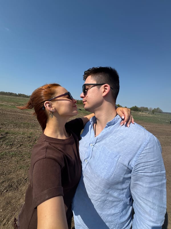 Couple photographs rural outing near Sivinskoe, Russia