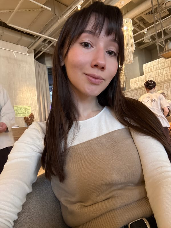 Woman enjoys traditional tea service in Kazan cafe