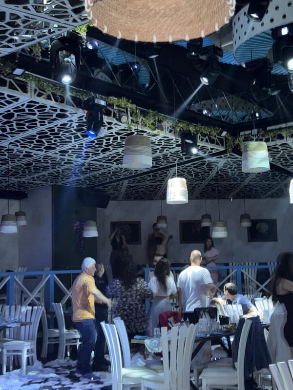 Evening dining scene captured in Plovdiv outdoor venue