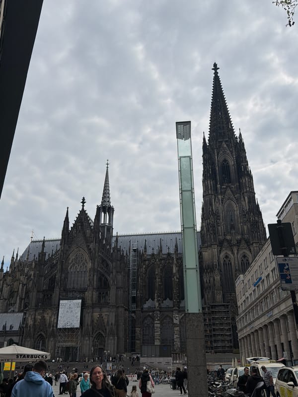 Cologne Cathedral district documented during cloudy afternoon street activity