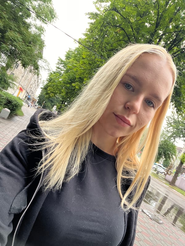 Outdoor selfies on a cloudy, rain-wet street