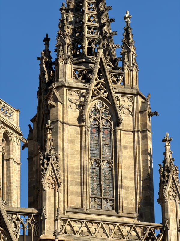 Up close with Barcelona Cathedral's Gothic facade on a sunny afternoon