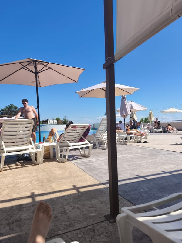Lazy summer morning at a hotel pool in Asenovgrad