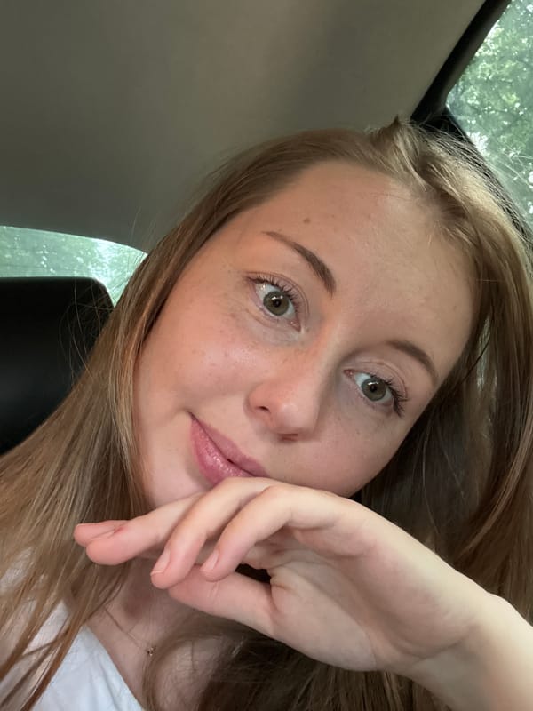 Woman documents shopping trip with car selfies and mall visits