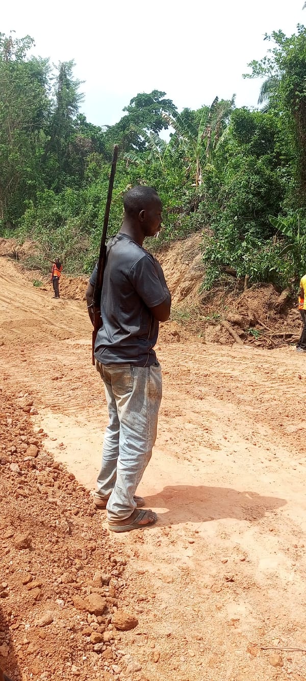 Road construction continues in Aloko Nigeria with dump trucks