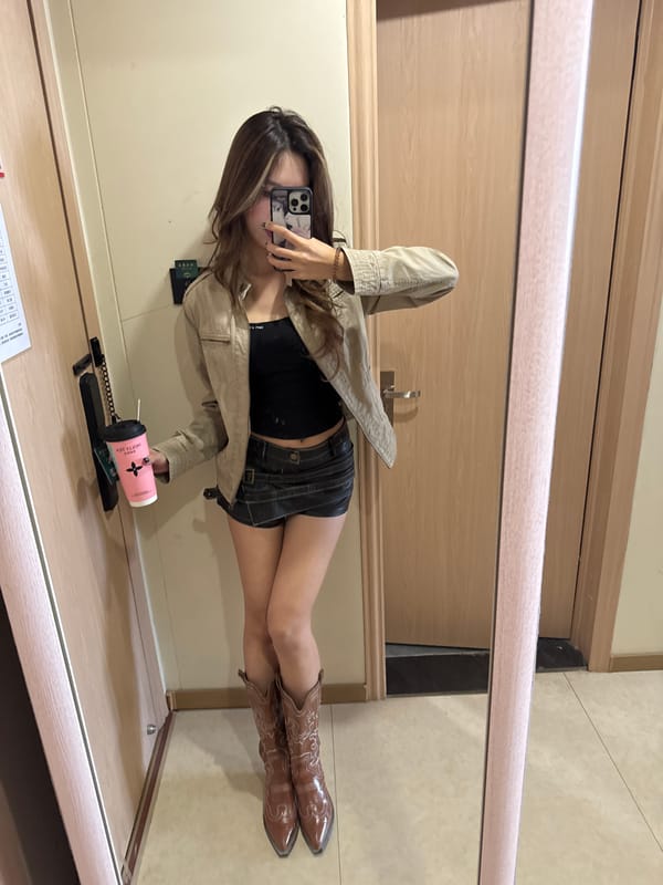 Women Take Mirror Selfies in Dunhuang Indoor Location