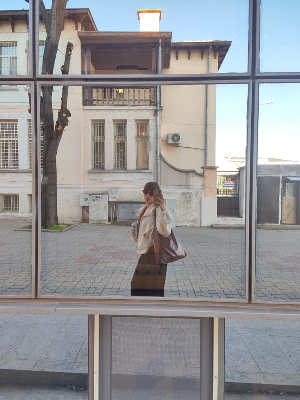 Woman Takes Morning Selfies in Sliven Interior Space