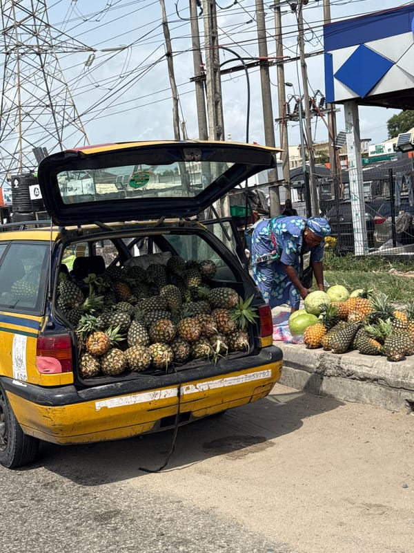 Woman operates fruit stand in Lekki, Nigeria
