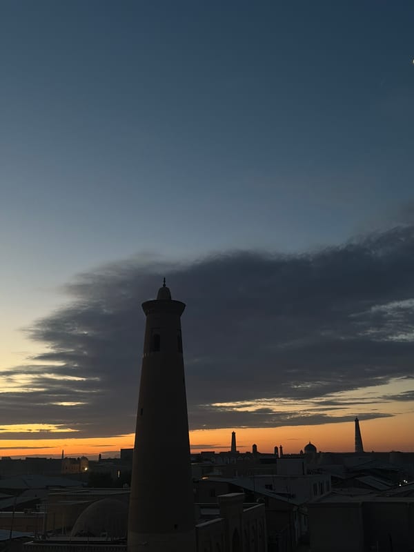 Sunset documented over historic Khiva, Uzbekistan from rooftop terraces