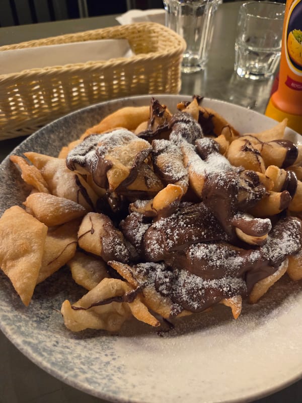 Witness captures plate of fried dough pastries