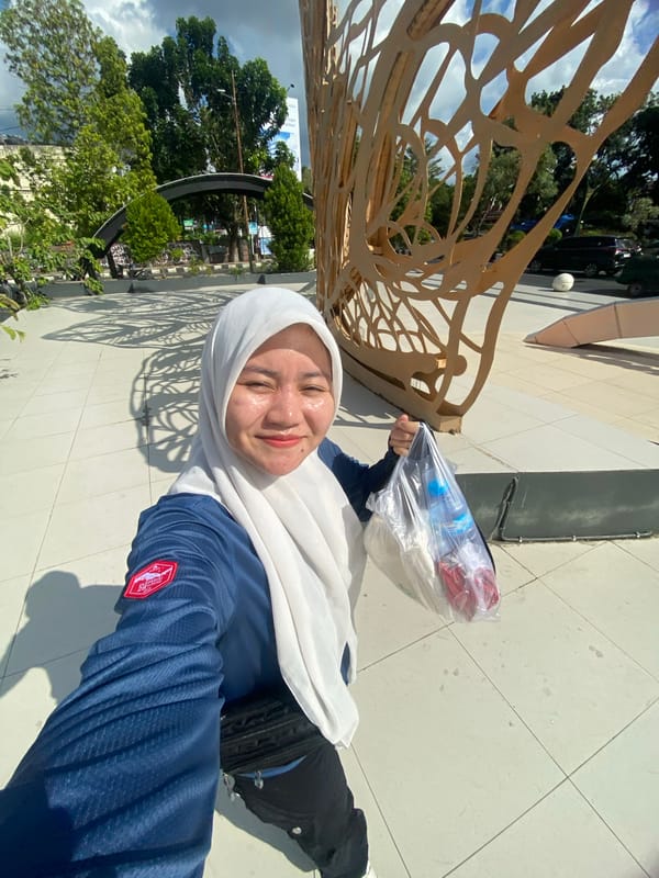 Exploring Banjarbaru's Taman Vanida park and city monument on a sunny morning