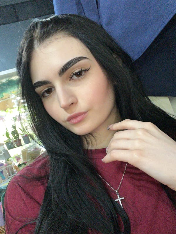 Woman poses for photos in Burgas flower shop