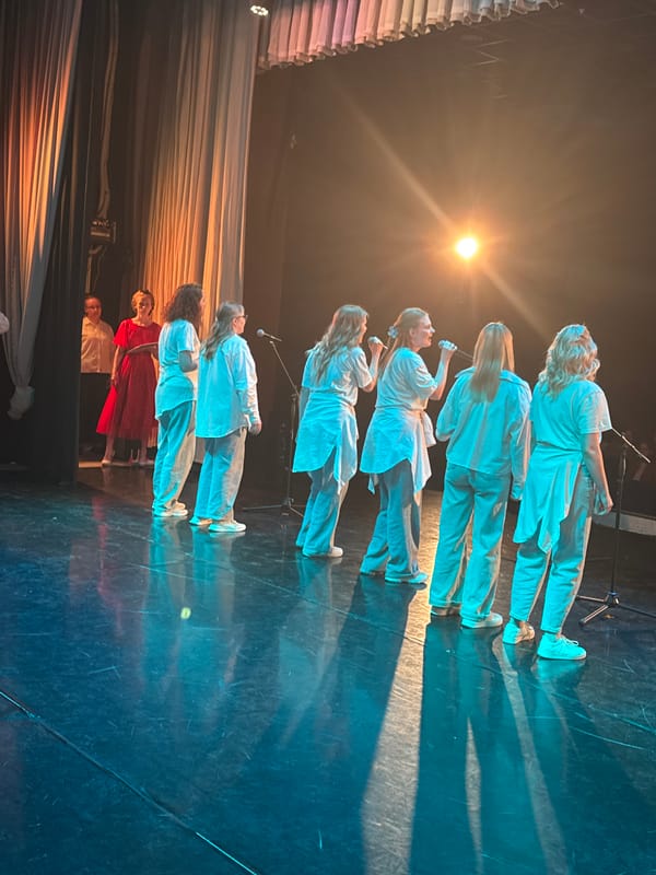 Seven women perform on stage in Perm, Russia