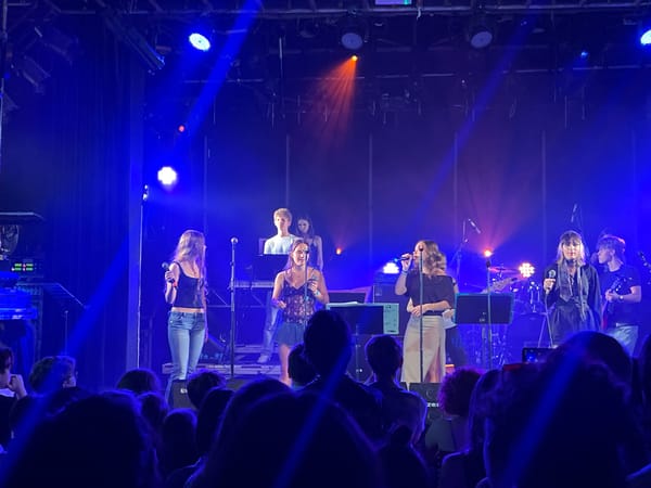Live music performance captured on illuminated stage in Vienna