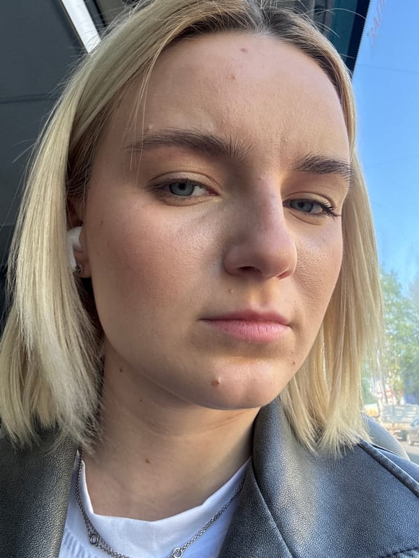 Woman photographs herself on Saint Petersburg public transport