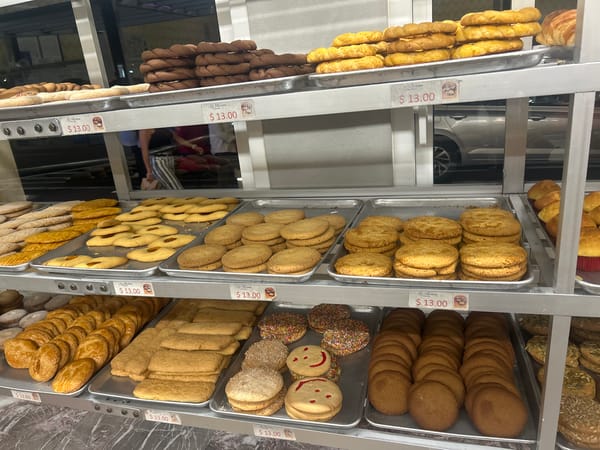 Fresh Mexican pastries and breads displayed at Puebla bakery