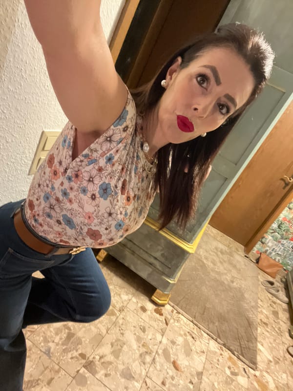 Woman takes multiple selfies in decorated room in Konz