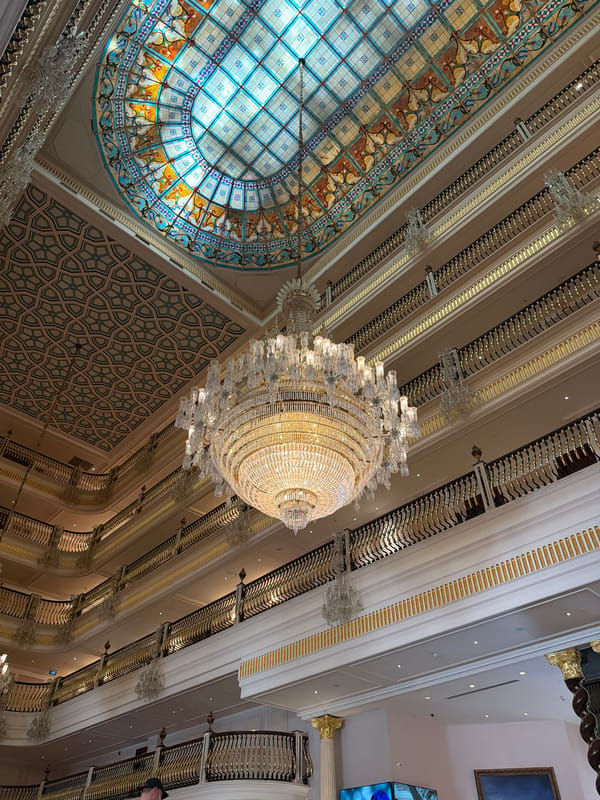 Ornate ceiling with crystal chandelier documented in Aksu, Turkey