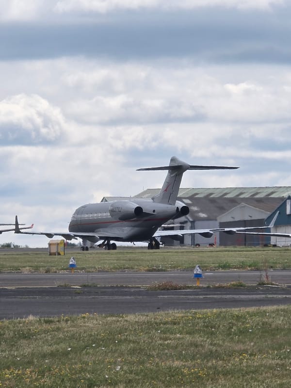 Private jets and prop planes at a quiet London-area airfield