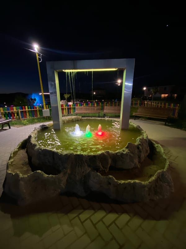 Colorful fountain lights up a park in Elin Pelin at night