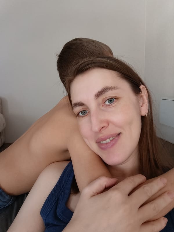 Mother and son share playful morning at home in Russia