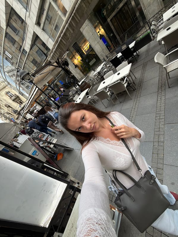 Woman takes selfies on Belgrade street and elevator