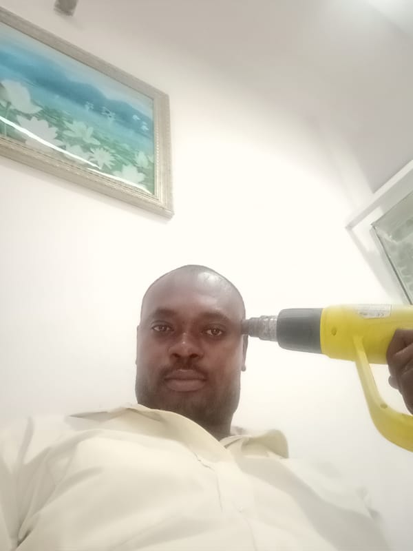 Office scenes and tool demonstration captured in Gwarinpa