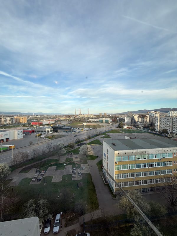 Dual perspectives captured in Sofia: cityscape and indoor portrait