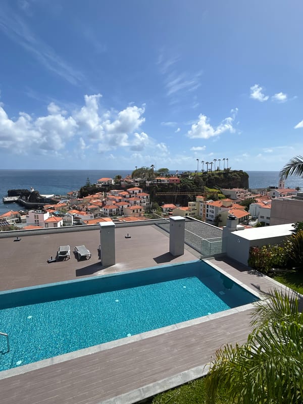 Tourist documents scenic coastal views of Câmara de Lobos