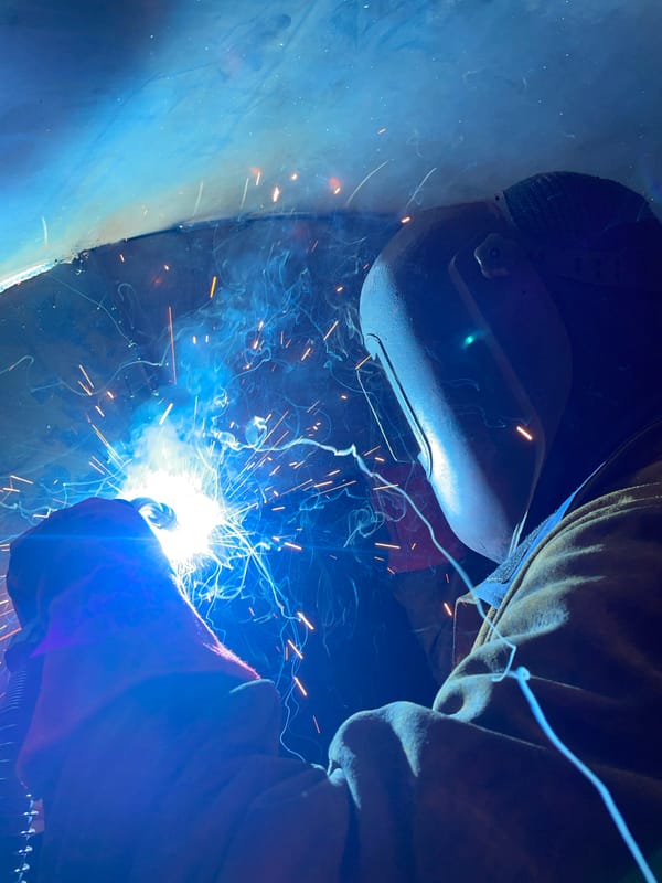 Industrial welding work documented inside metal structure in Montenegro