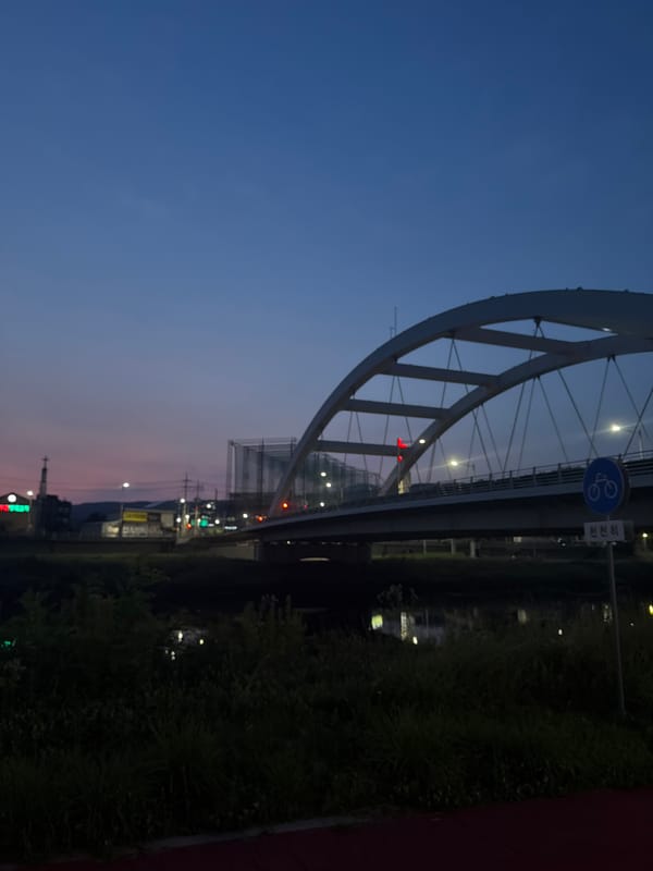 Dusk to nightfall along Dongducheon's riverside paths and bridges