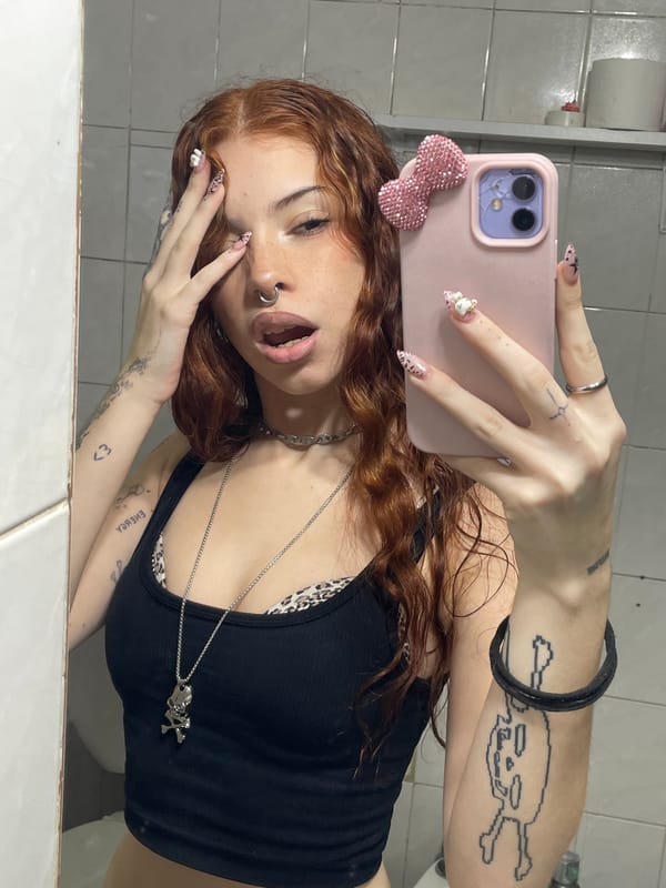 Mirror selfies captured in Buenos Aires bathroom Thursday evening
