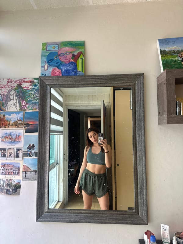 Person takes selfie, rests indoors in Puebla