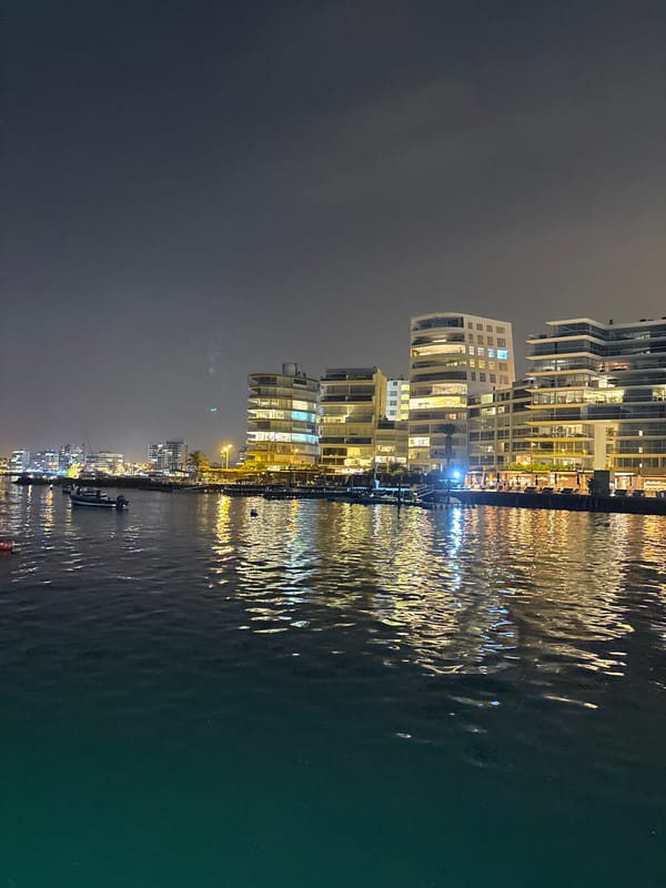 Nighttime harbor views captured in Ancón, Peru waterfront district